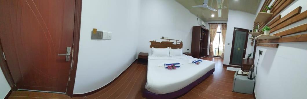Guraidhoo Palm Inn Bagian luar foto