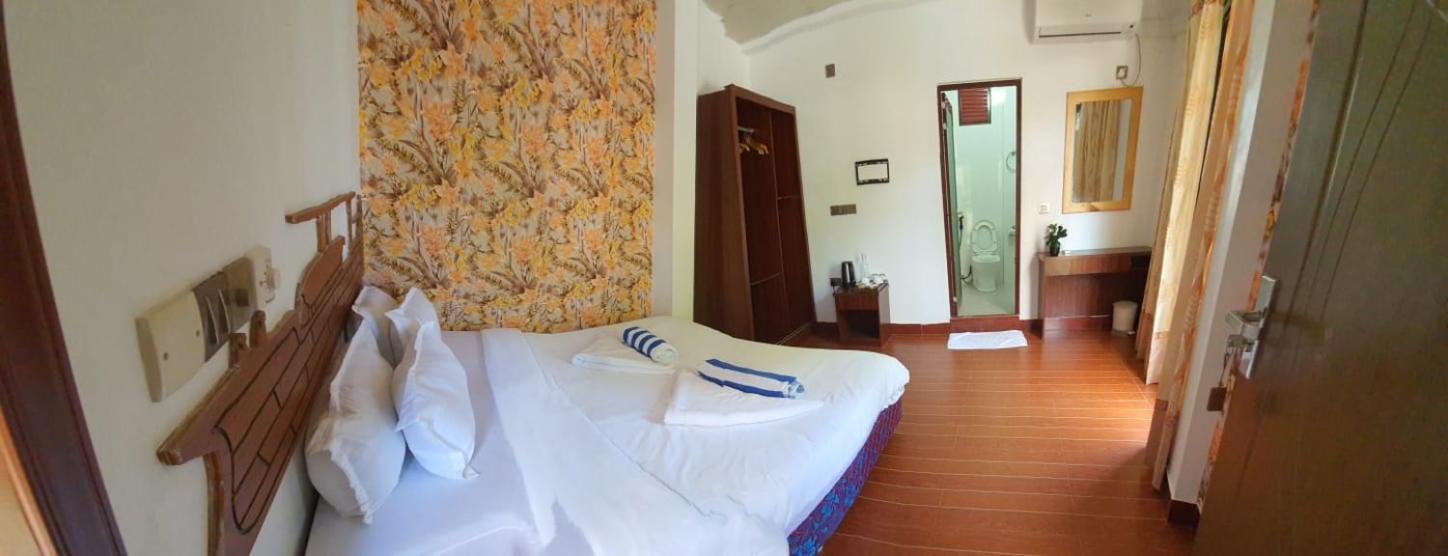 Guraidhoo Palm Inn Bagian luar foto